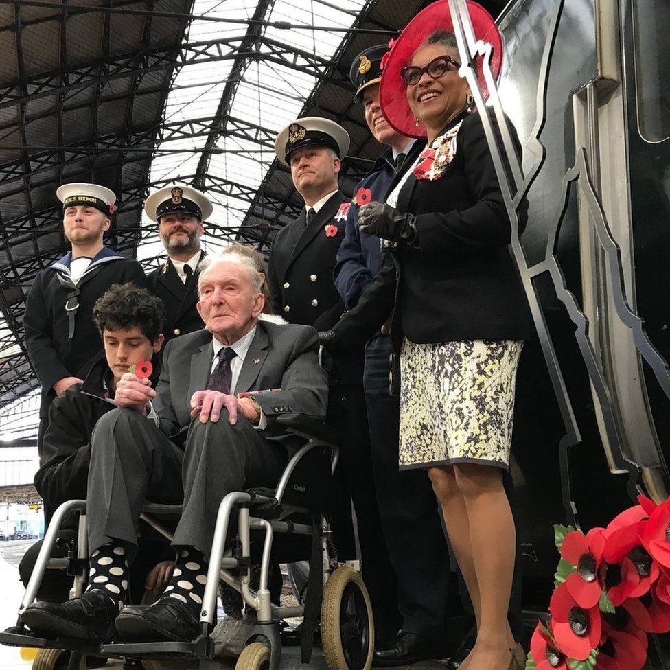 Dambuster veteran George "Johnny" Johnson and other service personnel at Bristol's Temple Meads station