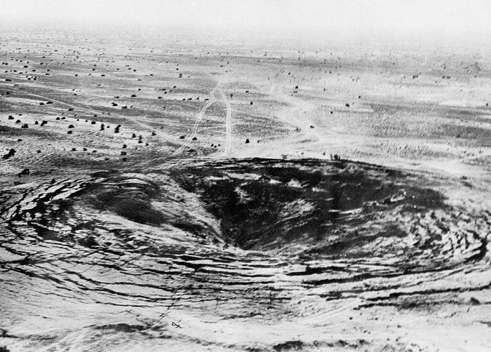 A crater marks the site of the first Indian underground nuclear test conducted 18 May 1974 at Pokhran in the desert state of Rajasthan. After a gap of twenty-four years, India carried out another series of five underground nuclear explosions on 11 and 13 May 1998, provoking criticism from many countries around the world. A government statement said the 13 May tests "completed the planned series" which began in the desert range of Pokhran near the Pakistani border on 11 May 1998. (Photo credit should read PUNJAB PHOTO/AFP/Getty Images)