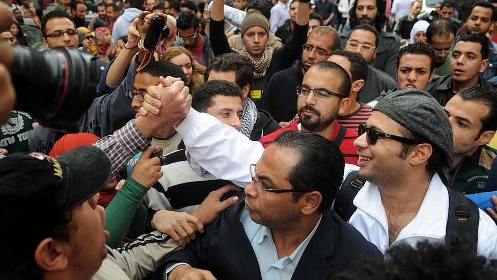 Ahmed Maher (right) at a protest in Cairo on 30 November 2013