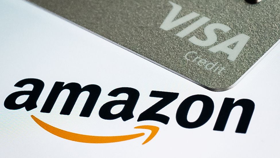 Visa credit card and Amazon logo
