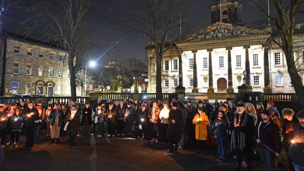People gather for a vigil at Dalton Square, Lancaster