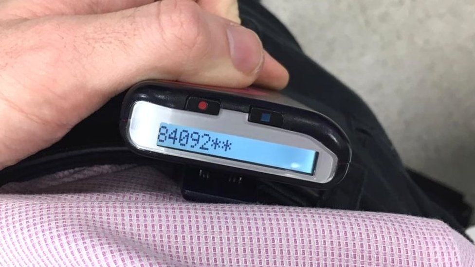A doctor with a pager