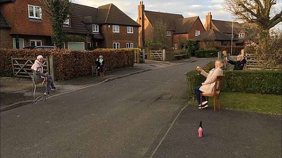 Coronavirus Nurse's exam success celebrated with social distancing