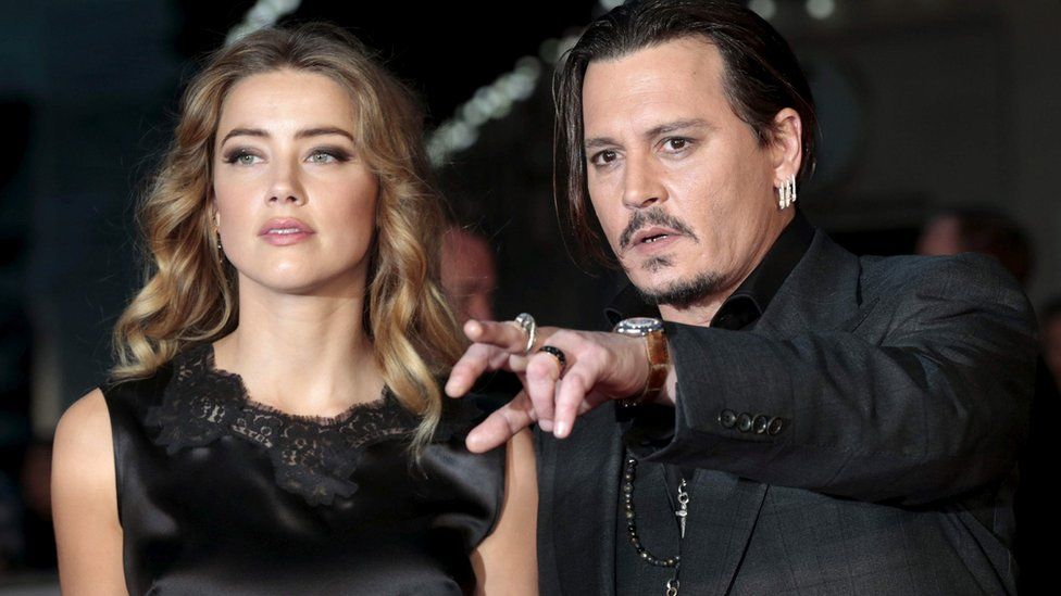 Amber Heard and Johnny Depp at a film premiere