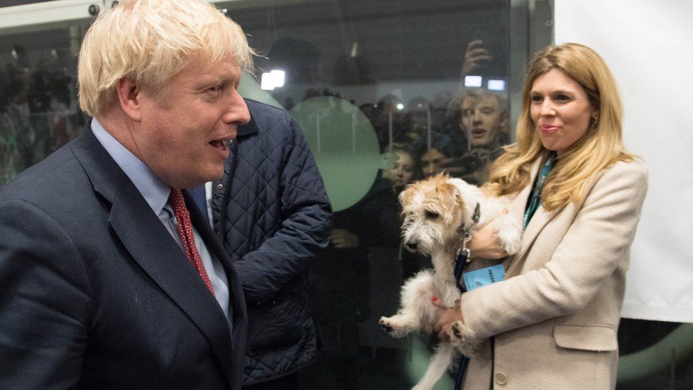 Boris Johnson and Carrie Symonds with their rescue dog