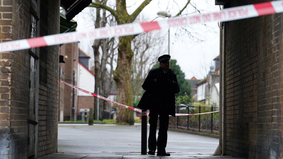 A Metropolitan Police officer at the scene outside Spenlow House in Jamaica Road, Bermondsey