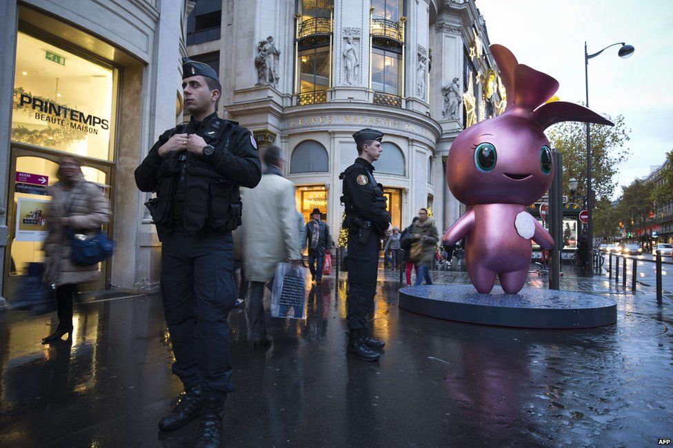 Police outside the Printemps department store in Paris, 19 November