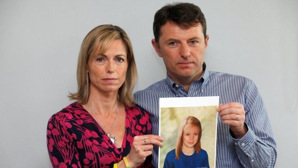 Kate and Gerry McCann pose with a computer generated image of how their missing daughter Madeleine in 2012