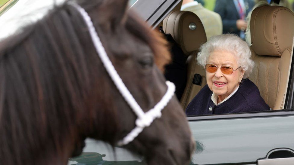 The Queen looks on a horse at the Royal Windsor Horse Show