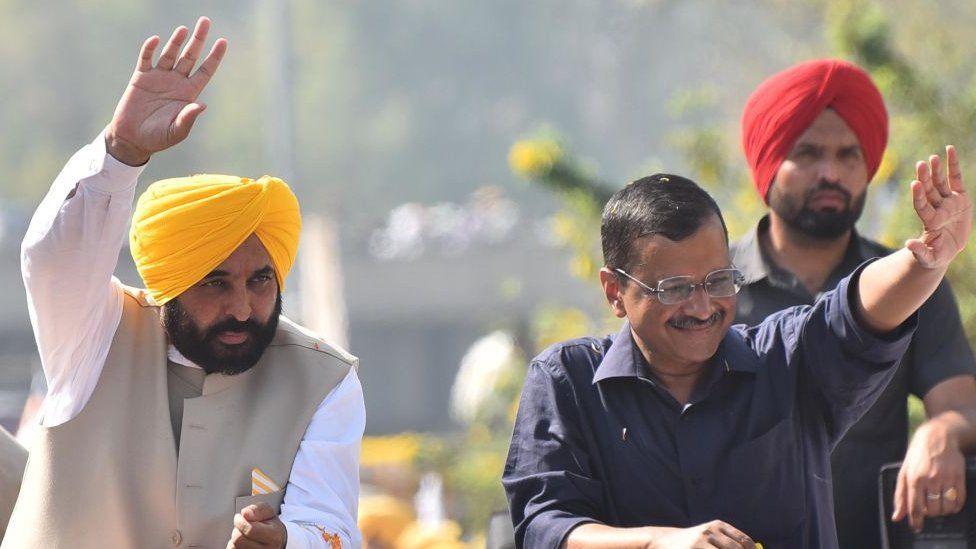 Aam Aadmi Party (AAP) national convener Arvind Kejriwal with Punjab chief minister-designate Bhagwant Mann during a road show to thank voters for the partys victory in Punjab assembly election on March 13, 2022 in Amritsar, India.