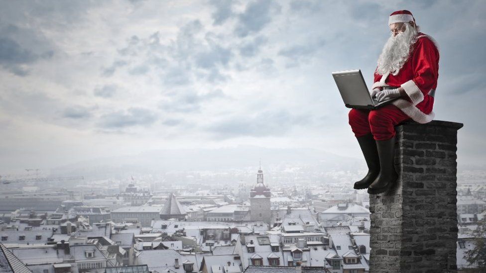Father Christmas on a laptop