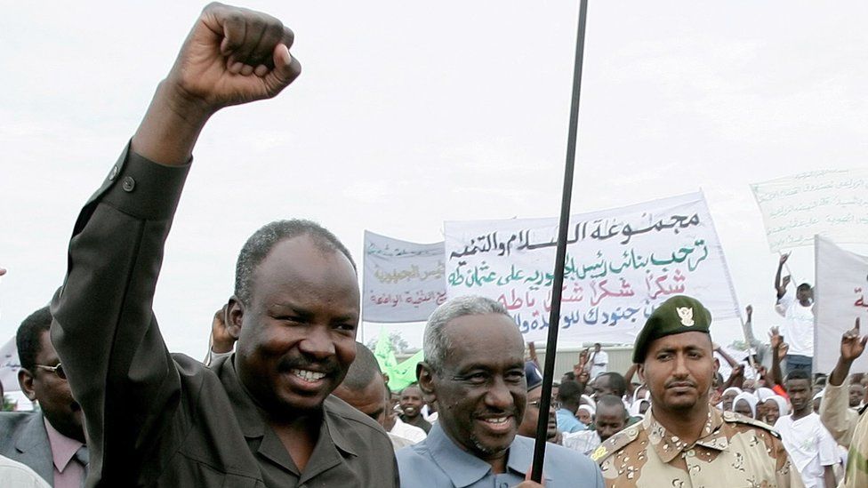 Haroun (left) in 2010 when he was governor of the South Kordofan region