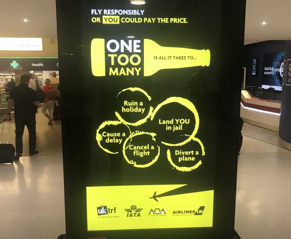 One Too Many campaign on screen at Manchester airport