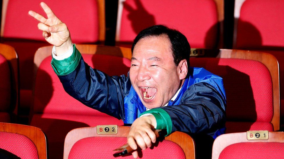 Member of opposition party Minju party reacts at exit poll results in Seoul, South Korea, on 13 April 2016