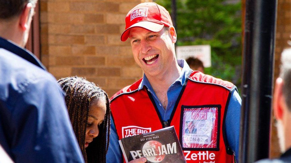 Prince William laughing as he sells The Big Issue