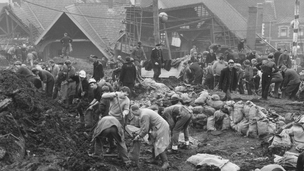 Rescue workers at the scene of the Aberfan disaster the following day