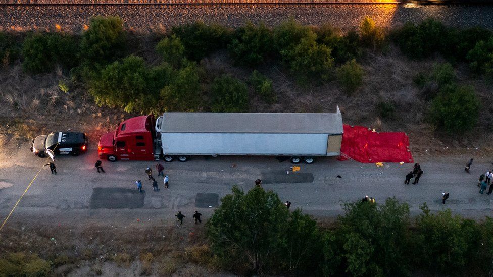 Image shows truck by road