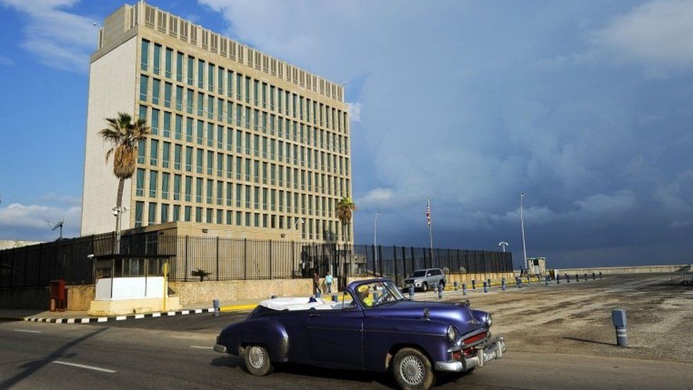 A vintage US car passing in front of the US Embassy in Havana (17,/2/ 2015)