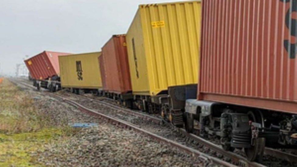 Freight train wagons partially derailed