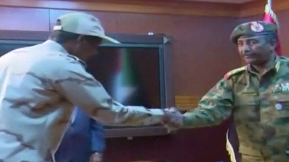 Hemedti in military clothes being sworn in as deputy of Sudan's transitional military council in Khartoum