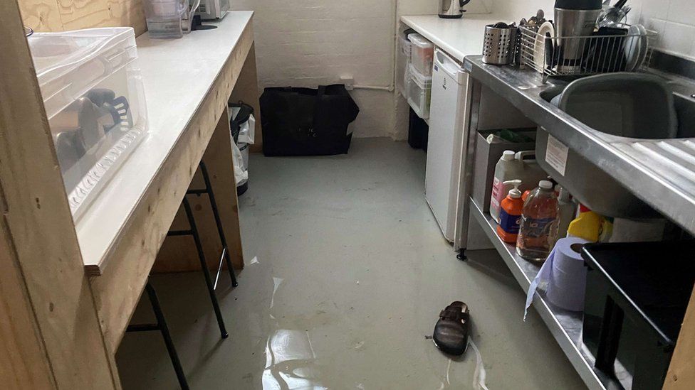 The flooded kitchen at Mr Goode's bookshop