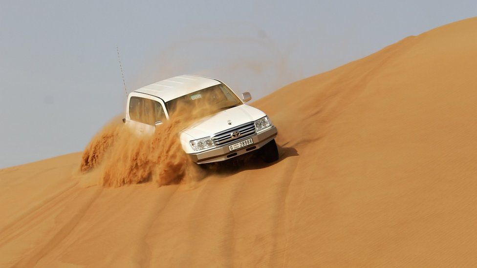 File photo: A car "dune bashing" in Dubai, 28 March 2006