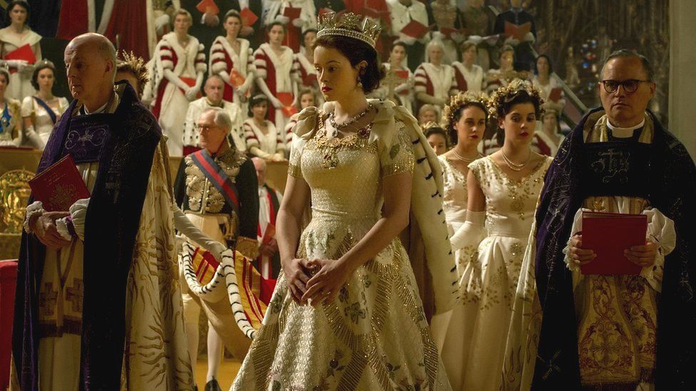 Claire Foy playing the Queen at her coronation in The Crown