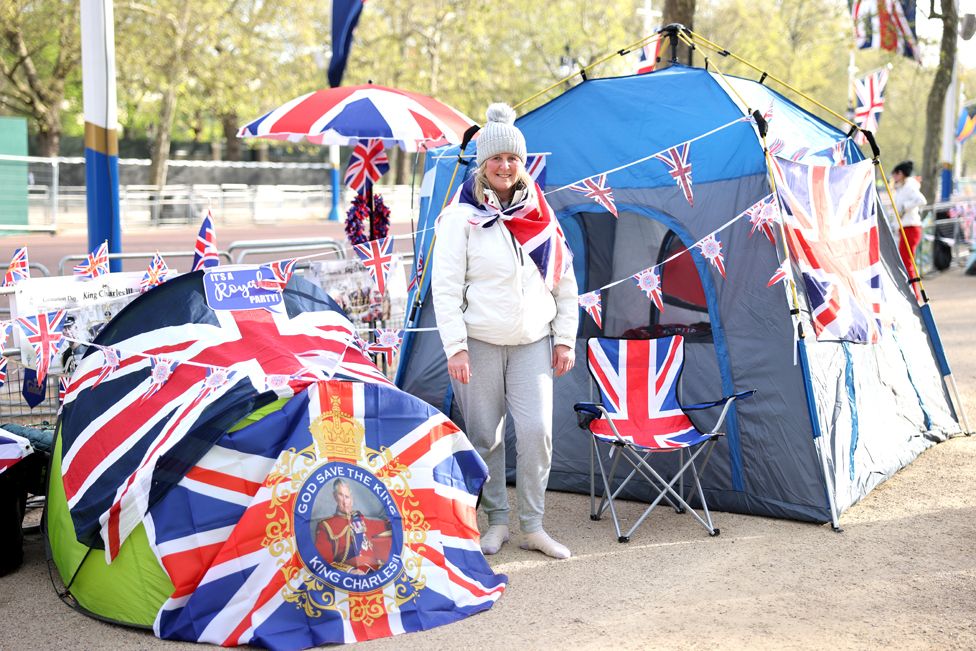 Lesley Warren, from Kent, poses for a photograph as she camps out on the Mall ahead of the Coronation.