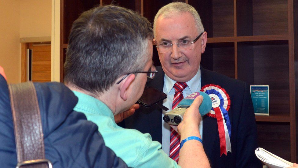 Danny Kennedy, UUP, speaks to the media following his defeat