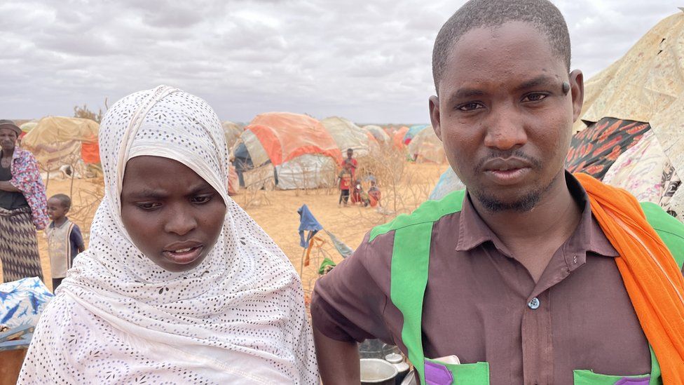 Kerad Adan and Hawa, Abdiwali's parents, outside their tent the day after their son died