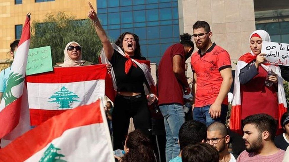 Nour Myra Jeha protesting in front of Lebanon's ministry of education