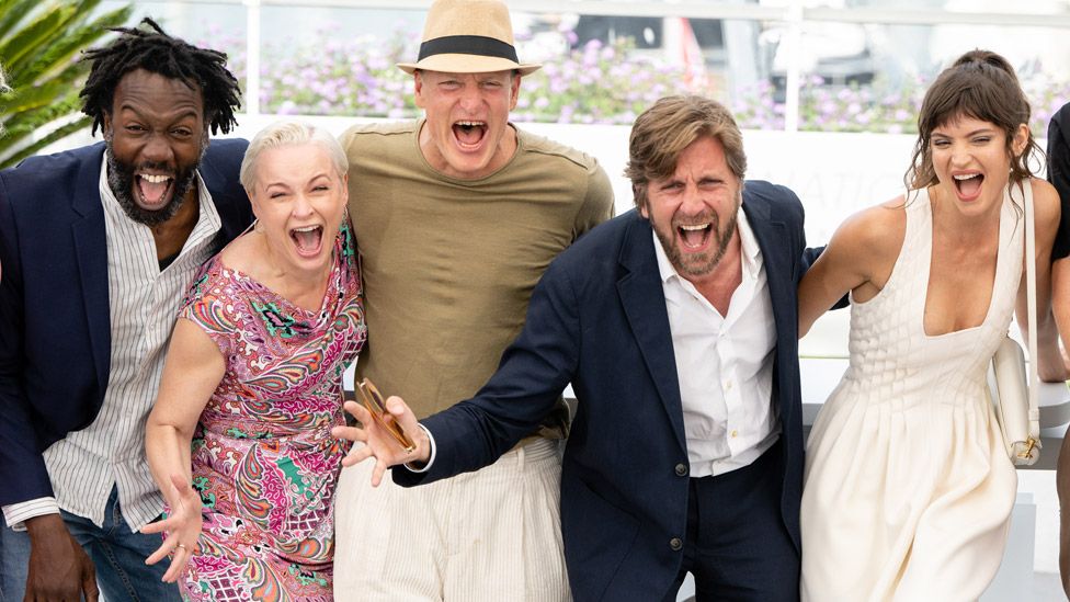 Left-right: Jean-Christophe Folly, Vicki Berlin, Woody Harrelson, Director Ruben Ostlund and Charlbi Dean attend the photocall for Triangle Of Sadness during the Cannes film festival