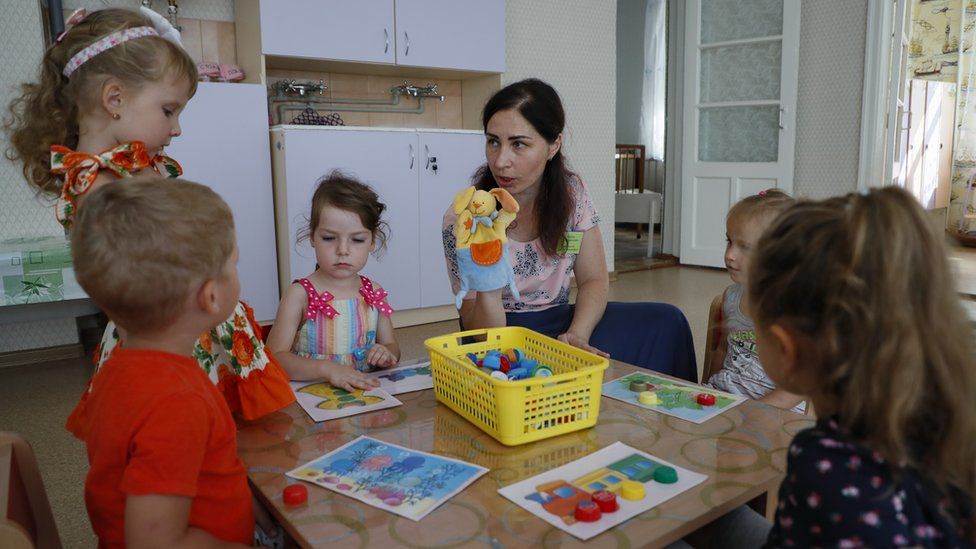 A picture taken during a visit to Berdyansk organized by the Russian military shows children at a newly opened kindergarten in Berdyansk, Zaporizhia region