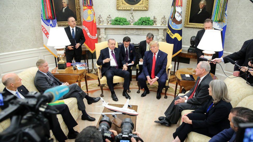 Turkish President Recep Tayyip Erdogan speaks during a meeting with President Donald Trump speaks and Republican Senators in the Oval Office of the White House