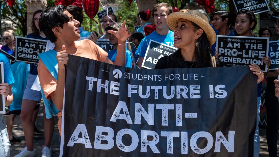 Pro-life protesters stand near the gate of the Texas state capitol at a protest outside the Texas state capitol on 29 May 2021 in Austin, Texas