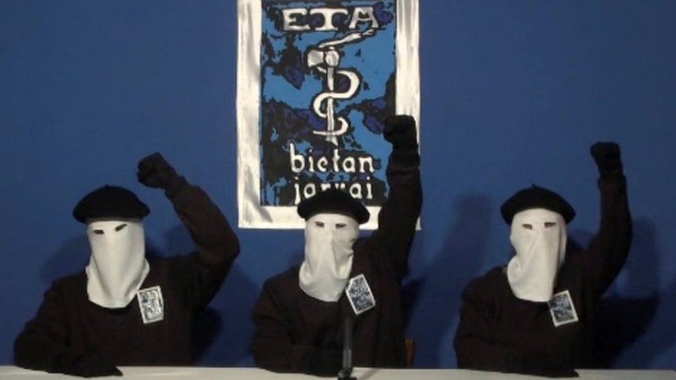 Three members of Basque separatist group ETA sit masked in a still image taken from a video published on the website of Basque language newspaper Gara on October 20, 2011.