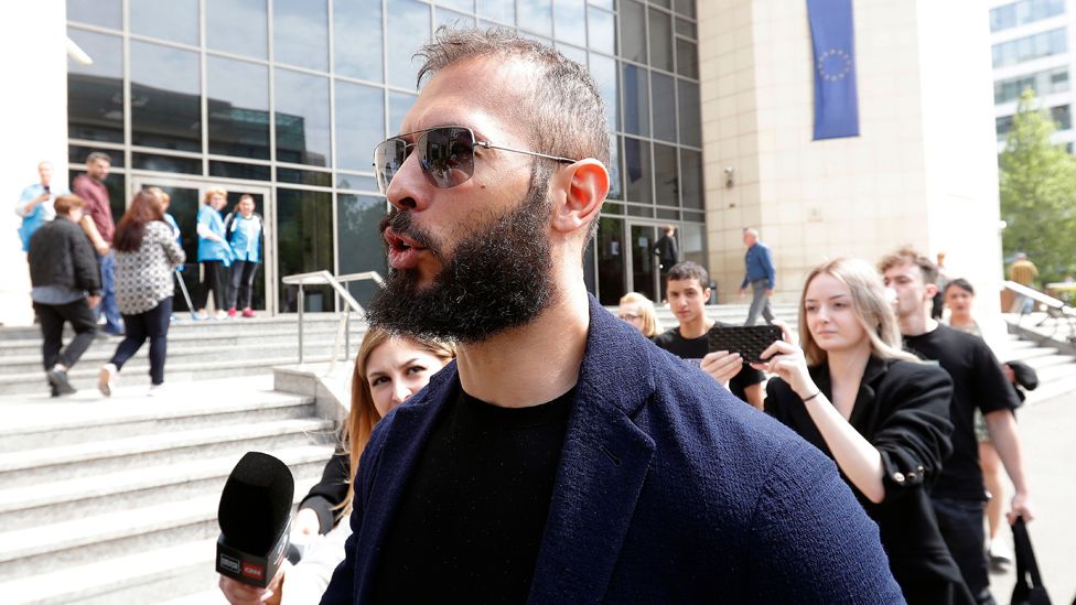 Andrew Tate leaving court in Bucharest in May 2023