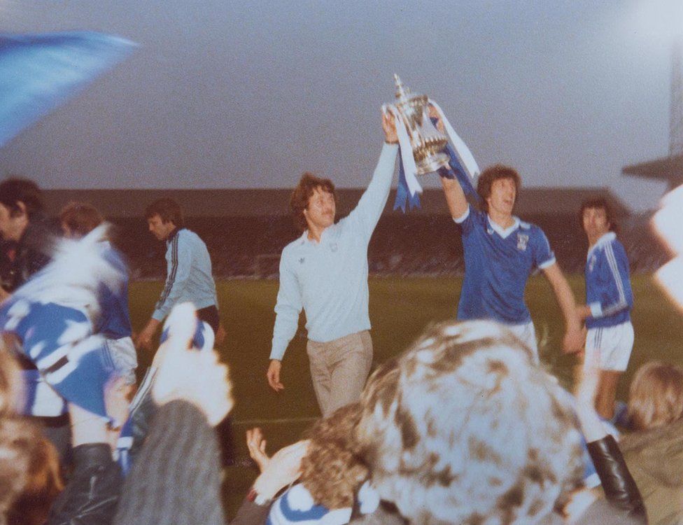 Ipswich players show off the Cup at Portman Road