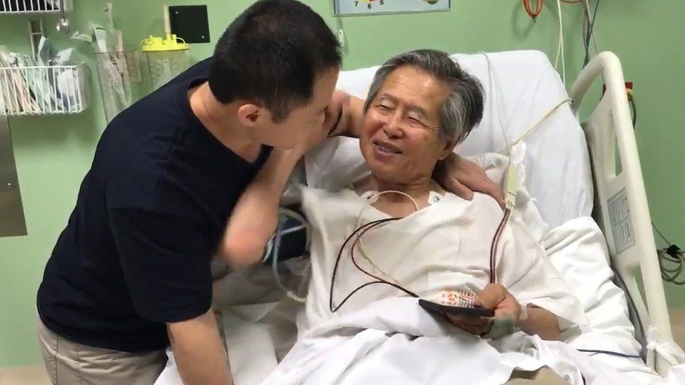 Kenji Fujimori announces the pardon to his father Alberto in hospital, 24 December