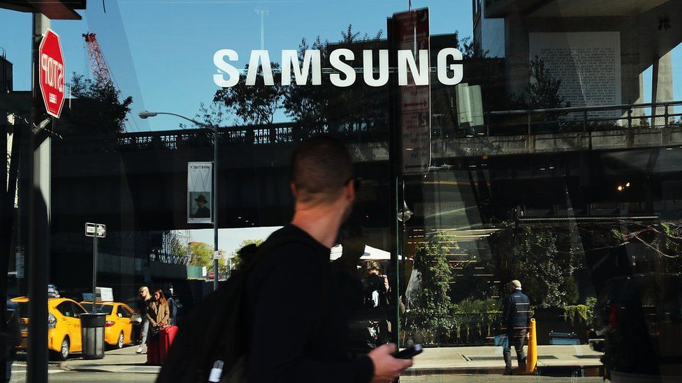 People walk by the new Samsung store in lower Manhattan