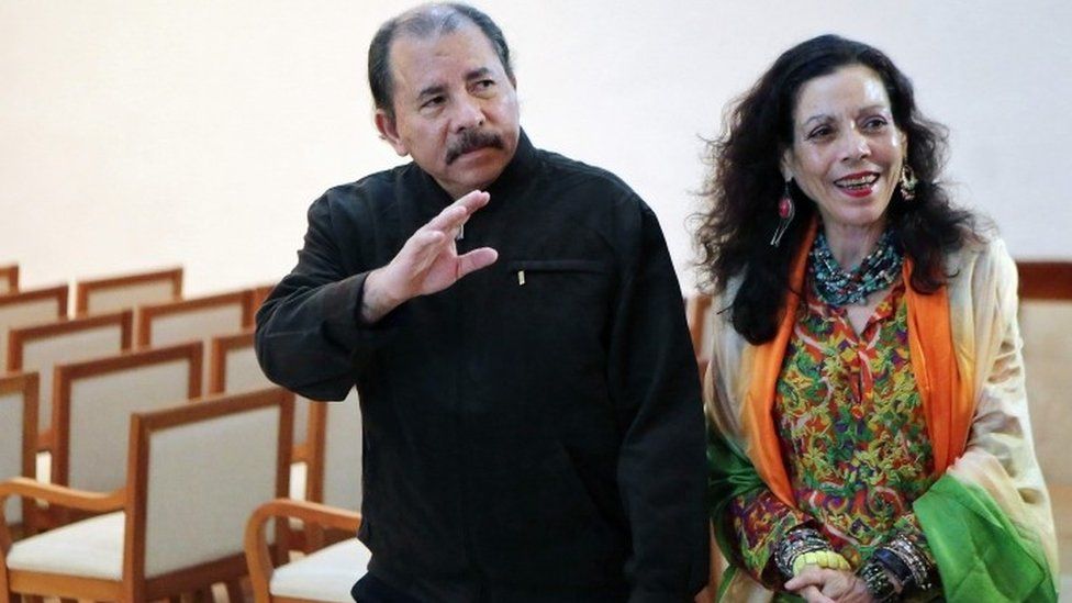 Nicaraguan President Daniel Ortega (left) next to his wife Rosario Murillo (04 December 2013)