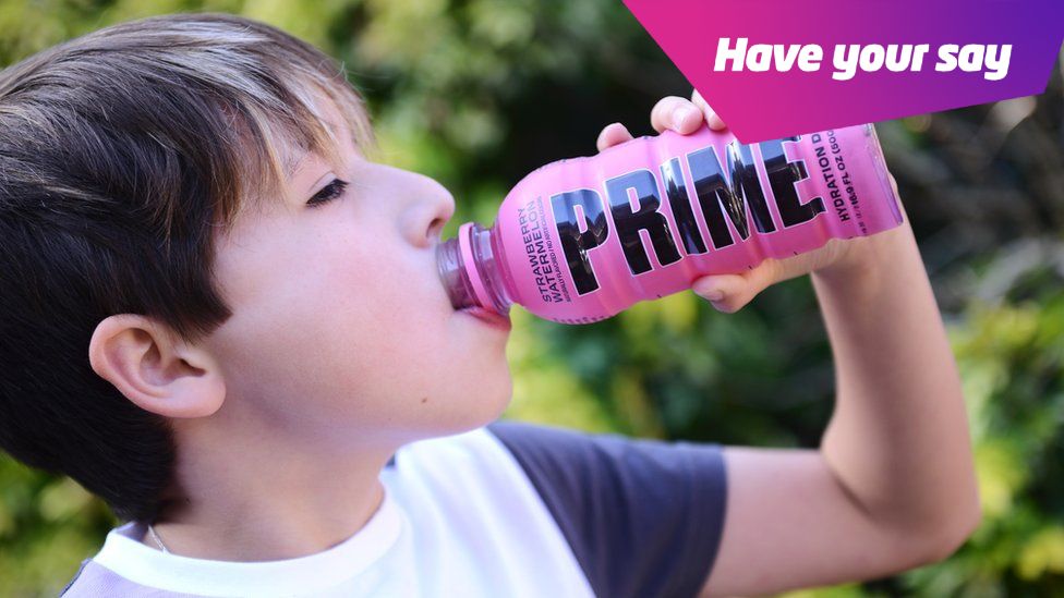 Young person drinking PRIME