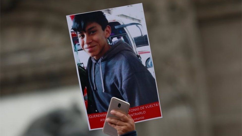 A demonstrator holds up a poster with a picture of high school student Marco Antonio Sanchez, who disappeared several days ago after a dispute with police officers, according to local media, in a protest march demanding to know his whereabouts at the Angel of Independence in Mexico City, Mexico January 28, 2018.
