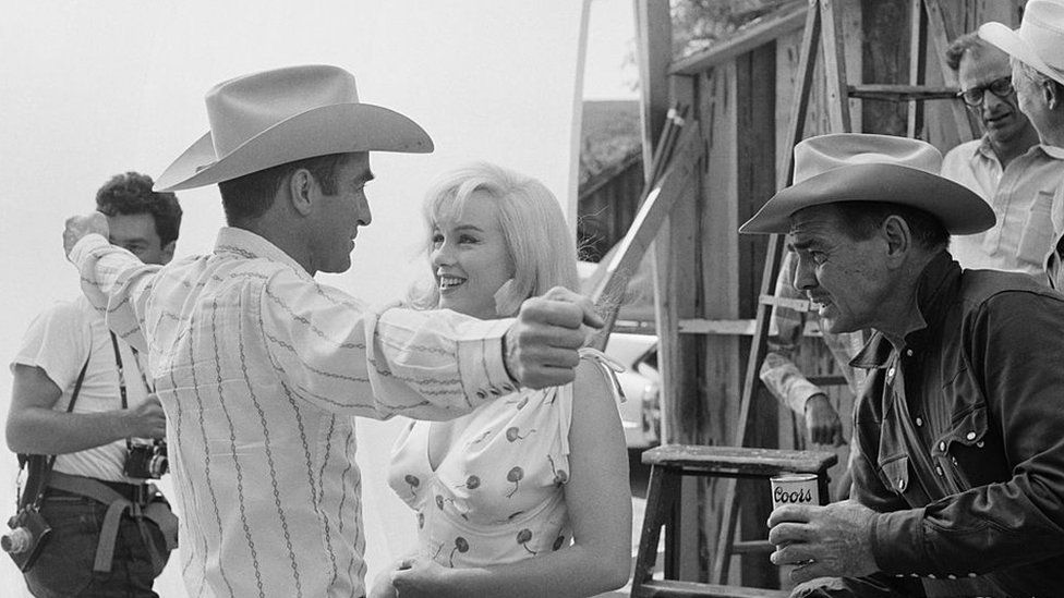 Actors Montgomery Clift, Marilyn Monroe and Clark Gable on the set of The Misfits in the Nevada Desert, 1960
