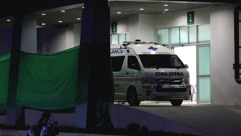An ambulance parks at the entrance of Chiang Rai Prachanukroh hospital