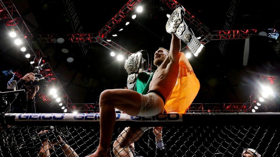 Conor McGregor celebrating his UFC lightweight championship victory over Eddie Alvarez in November 2016.