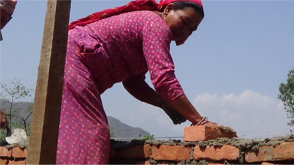 Sanumaya Kumal at building site in Bidur in Nuwakot district