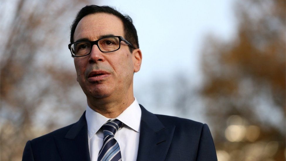 U.S. Treasury Secretary Steven Mnuchin speaks to the news media after giving a television interview at the White House