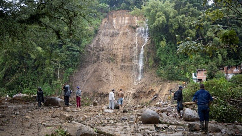 A gash in the lush foliage covering a mounting after a landslide in Colombia. Photo: 8 February 2022