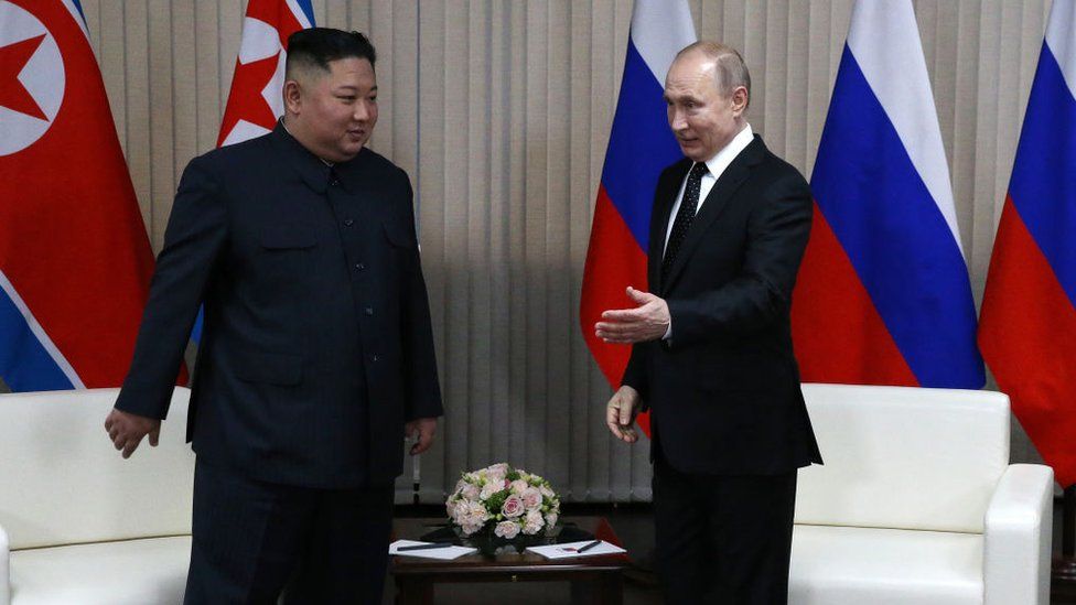 Jong Un Kim and Vladimir Putin